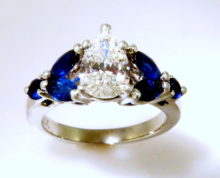 Diamond with marquis Blue sapphire on the side